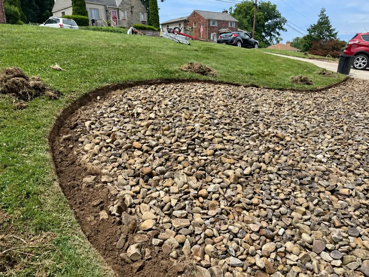 River Rock Bed Edge Cleanup